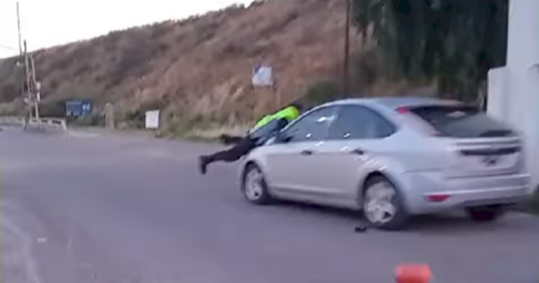 video-|-indignante:-arrastro-a-un-policia-sobre-su-auto-para-evitar-un-control-de-alcoholemia-en-viedma